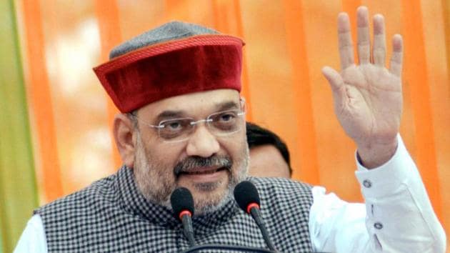BJP chief Amit Shah addresses an election rally while campaigning for party candidate Arjun Singh from Jawali constituency in Kangra district on Monday. (PTI Photo) BJP chief Amit Shah addresses an election rally while campaigning for party candidate Arjun Singh from Jawali constituency in Kangra district on Monday. (PTI Photo)