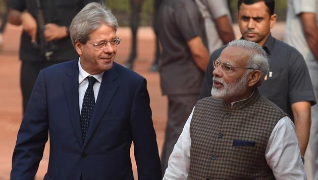 Prime Minister Narendra Modi talks with Italy's PM Paolo Gentiloni during a reception in New Delhi on Monday. (AFP) Prime Minister Narendra Modi talks with Italy's PM Paolo Gentiloni during a reception in New Delhi on Monday. (AFP)