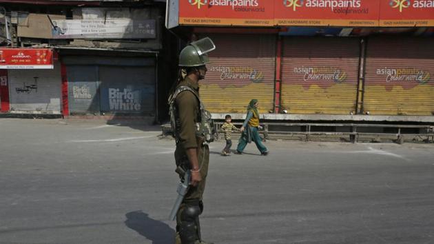 A paramilitary soldier stands guard during a strike called by separatists in Srinagar.(AP File Photo)