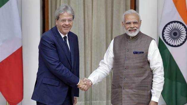 Prime Minister Narendra Modi shakes hand with his Italian counterpart Paolo Gentiloni before their meeting in New Delhi on October 30. (AP Photo) Prime Minister Narendra Modi shakes hand with his Italian counterpart Paolo Gentiloni before their meeting in New Delhi on October 30. (AP Photo)