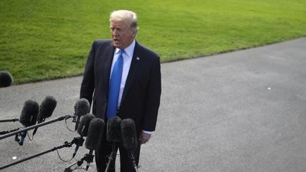 US President Donald Trump talks with reporters before leaving the White House for Dallas, on October 25, 2017. (Reuters Photo) US President Donald Trump talks with reporters before leaving the White House for Dallas, on October 25, 2017. (Reuters Photo)