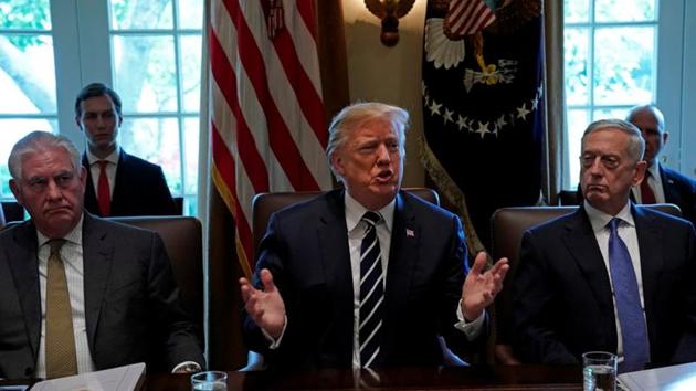 Flanked by secretary of state Rex Tillerson and defence secretary James Mattis, US President Donald Trump meets with members of his cabinet at the White House in Washington, US. (REUTERS) Flanked by secretary of state Rex Tillerson and defence secretary James Mattis, US President Donald Trump meets with members of his cabinet at the White House in Washington, US. (REUTERS)