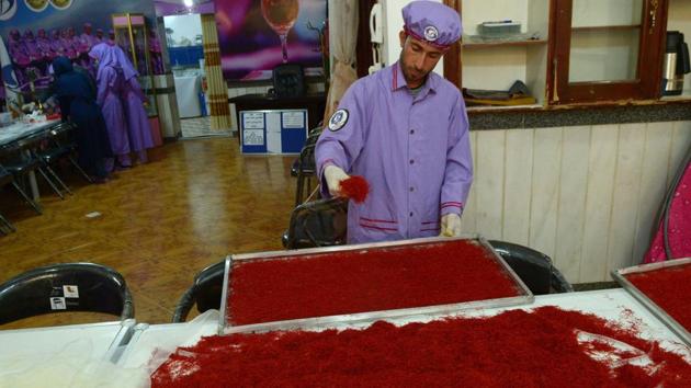 An Afghan worker sorts saffron at a cleaning centre in Herat. Until such issues are addressed, poppy cultivation will continue to dominate Afghanistan, which produces 80 percent of the world’s opium, with around 4,800 tonnes of the drug bringing in revenues of three billion dollars in 2016, according to the United Nations. If trends follow previous years, according to the UNODC opium production would still provide about half of the Taliban’s revenues as it did in 2016. (Hoshang Hashimi / AFP)