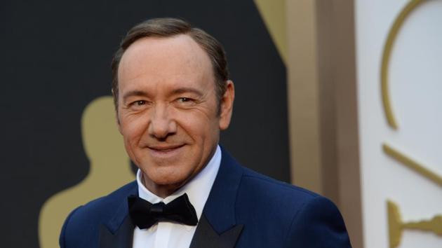 This file photo taken on March 02, 2014 shows actor Kevin Spacey arriving on the red carpet for the 86th Academy Awards in Hollywood, California. Actor Anthony Rapp accused Kevin Spacey of a sexual advance in 1986 when Spacey was 26 and Rapp only 14.(AFP)