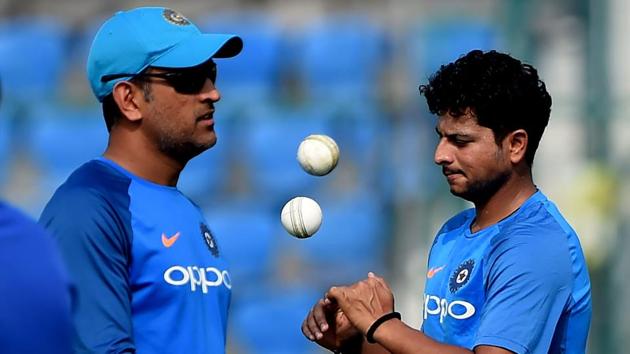 Kuldeep Yadav (R) has developed a new way to counter the dew factor during the India vs New Zealand T20 in New Delhi. (AFP) Kuldeep Yadav (R) has developed a new way to counter the dew factor during the India vs New Zealand T20 in New Delhi. (AFP)