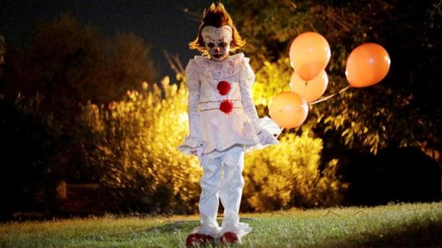 A boy dressed as Pennywise, the dancing clown from the movie ‘It’ poses for a photo during a Halloween party in Ciudad Juarez, Mexico. (Jose Luis Gonzalez / REUTERS)