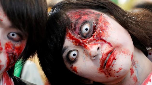 Participants pose during a Halloween event in Kawasaki, Japan. The scariest night of the year is back, when according to age-old belief, spirits roam the earth and prey on humans. Halloween, or the festival of the dead is celebrated traditionally across the world from October 31 to November 1. (Kim Kyung-Hoon / REUTERS)