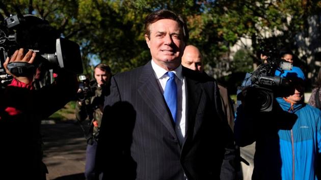 Former Trump campaign chairman Paul Manafort leaves US federal court after being arraigned on 12 charges in the investigation into alleged Russian meddling in the 2016 presidential election. (Reuters)