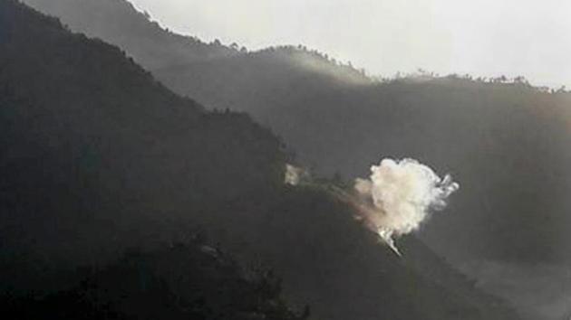 Smoke rises from a mortar fired by Pakistan near the Line of Control in Jammu and Kashmir's Poonch.(PTI file photo)
