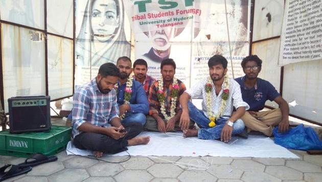 Tribal students of Hyderabad university protest at Velivada, a makeshift protest site where Rohith Vemula once raised slogans. (HT Photo) Tribal students of Hyderabad university protest at Velivada, a makeshift protest site where Rohith Vemula once raised slogans. (HT Photo)
