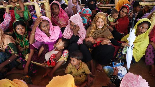 Rohingya Muslim refugees wait to receive food and other aids distributed by different organisations at Thaingkhali refugee camp in Ukhia, Bangladesh, on October 30. (AFP file) Rohingya Muslim refugees wait to receive food and other aids distributed by different organisations at Thaingkhali refugee camp in Ukhia, Bangladesh, on October 30. (AFP file)