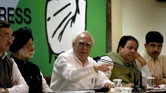 Congress leader Kapil Sibal and other leaders address the medi in New Delhi on Wednesday. (Sushil Kumar/HT Photo) Congress leader Kapil Sibal and other leaders address the medi in New Delhi on Wednesday. (Sushil Kumar/HT Photo)