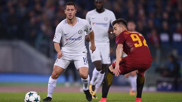 Chelsea midfielder Eden Hazard (L) fights for the ball with Roma striker Stephan El Shaarawy during a UEFA Champions League match at the Olympic Stadium in Rome.(AFP)