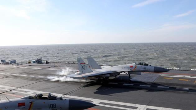 A Chinese J-15 fighter jet on the deck of the Liaoning aircraft carrier during military drills in the Bohai Sea, off China's northeast coast. (AFP file) A Chinese J-15 fighter jet on the deck of the Liaoning aircraft carrier during military drills in the Bohai Sea, off China's northeast coast. (AFP file)