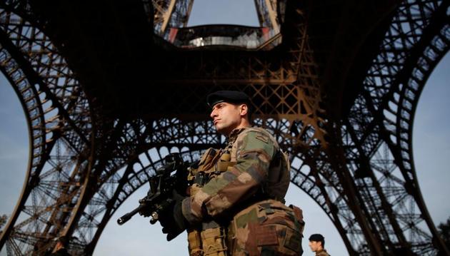 A French soldier patrols in front of the Eiffel Tower on November 1, 2017 in Paris, as France officially ends the state of emergency. (AFP) A French soldier patrols in front of the Eiffel Tower on November 1, 2017 in Paris, as France officially ends the state of emergency. (AFP)