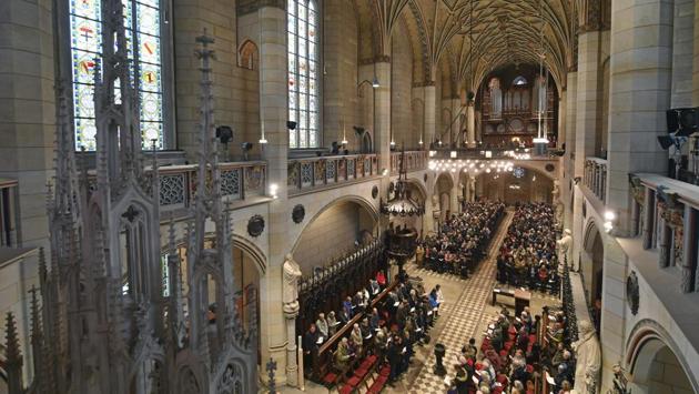 Visitors attend a service in the All Saints’ Church or Castle Church on October 31, 2017. The Vatican and Lutheran World Federation released a rare joint statement on the anniversary, saying they ‘begged forgiveness for our failures and for the ways in which Christians have wounded the Body of the Lord and offended each other during the five hundred years since the beginning of the Reformation until today.’ (Hendrik Schmidt / dpa via AP) 