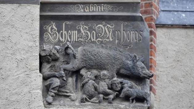 A medieval anti-Semitic carving depicting Jews suckling the teats of a sow as a rabbi looks intently is pictured at the Stadtkirche, Martin Luther’s home church in Wittenberg. The theologian’s name has also been associated with one of Germany’s darkest periods --his attacks on Judaism in his writings were used as a reference for Nazi ideology. Merkel has said it was essential that Luther’s anti-Semitism never be scrubbed from his theological legacy. (John Macdougall / AFP) 