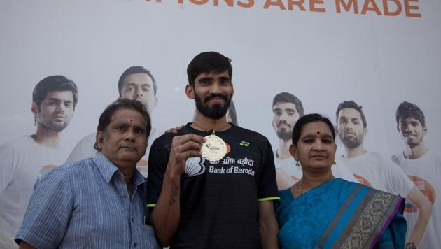 Indian badminton player Kidambi Srikanth along with his parents poses with the French Open winner’s medal in Hyderabad on Tuesday. (AP) Indian badminton player Kidambi Srikanth along with his parents poses with the French Open winner’s medal in Hyderabad on Tuesday. (AP)