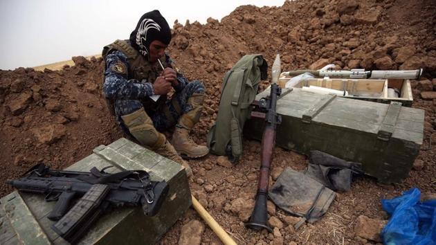 Iraqi forces gather at their camp on the front line near the border town of Fishkhabur on October 28, 2017. The pro-independence camp won a crushing victory in the non-binding poll which Baghdad considered illegal, and Prime Minister Haider al-Abadi ordered Iraqi troops to take control of areas claimed by both Baghdad and the KRG. (Ahmad Al- Rubaye / AFP ) Iraqi forces gather at their camp on the front line near the border town of Fishkhabur on October 28, 2017. The pro-independence camp won a crushing victory in the non-binding poll which Baghdad considered illegal, and Prime Minister Haider al-Abadi ordered Iraqi troops to take control of areas claimed by both Baghdad and the KRG. (Ahmad Al- Rubaye / AFP )