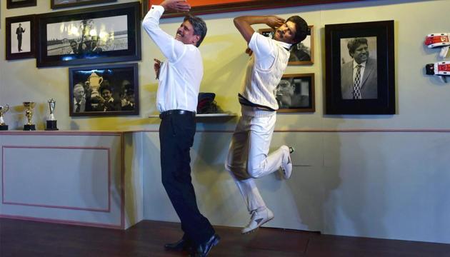 Former Indian cricket captain Kapil Dev shows his famous bowling action besides his wax statue at Madame Tussauds in New Delhi recently. (PTI) Former Indian cricket captain Kapil Dev shows his famous bowling action besides his wax statue at Madame Tussauds in New Delhi recently. (PTI)
