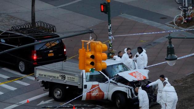 Police investigate a vehicle used in a ramming incident on the West Side Highway in Manhattan, New York, US, on Tuesday night. (REUTERS) Police investigate a vehicle used in a ramming incident on the West Side Highway in Manhattan, New York, US, on Tuesday night. (REUTERS)