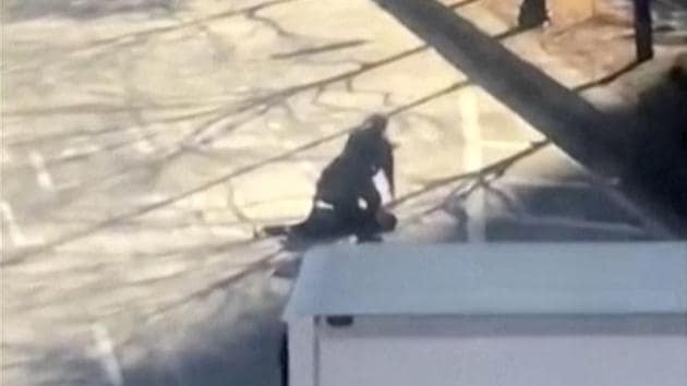 This image made from a video shows the suspect in a deadly attack being apprehended by police on Tuesday in New York. (AP) This image made from a video shows the suspect in a deadly attack being apprehended by police on Tuesday in New York. (AP)