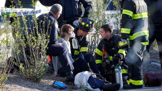 A woman is aided by first responders after sustaining injury on a bike path in lower Manhattan. Five of the people killed were Argentine tourists who travelled to New York for a 30-year high school reunion, said a senior official in Santa Fe province, where they were from. Belgian officials said one of those killed and three of the injured were from Belgium. (Brendan McDermid / REUTERS) A woman is aided by first responders after sustaining injury on a bike path in lower Manhattan. Five of the people killed were Argentine tourists who travelled to New York for a 30-year high school reunion, said a senior official in Santa Fe province, where they were from. Belgian officials said one of those killed and three of the injured were from Belgium. (Brendan McDermid / REUTERS)