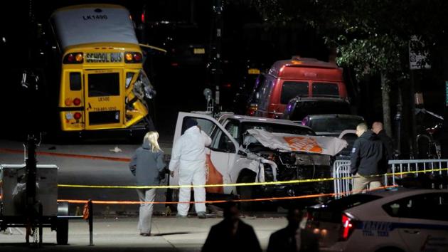 Police investigate a pickup truck used in an attack on the West Side Highway in Manhattan, New York, on Wednesday. (Reuters) Police investigate a pickup truck used in an attack on the West Side Highway in Manhattan, New York, on Wednesday. (Reuters)