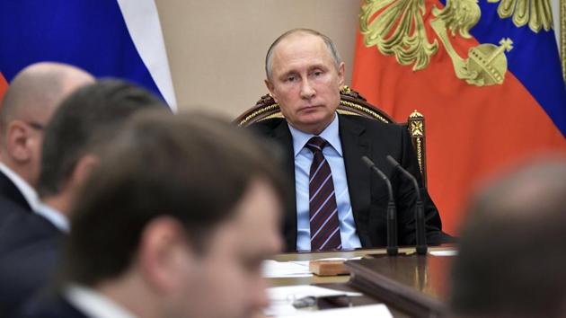 Russian President Vladimir Putin, center, chairs a cabinet meeting in Moscow, Russia. (AP) Russian President Vladimir Putin, center, chairs a cabinet meeting in Moscow, Russia. (AP)