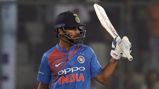 India's Shikhar Dhawan raises his bat after scoring a half-century first Tw20 match against New Zealand in New Delhi. (AP) India's Shikhar Dhawan raises his bat after scoring a half-century first Tw20 match against New Zealand in New Delhi. (AP)