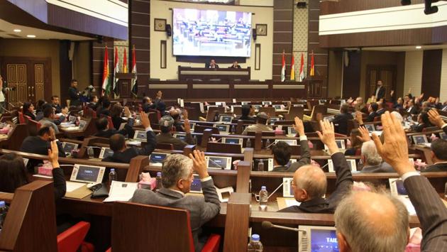 A general view of Kurdish MPs sitting during a session of Kurdistan’s regional parliament in Erbil. Massud Barzani accused his political rivals of ‘high treason’ for giving up the contested oil-rich city of Kirkuk to central government troops. The KRG and the central government held talks from Friday till Sunday last week to resolve their conflict. (KURDISH PRIME MINISTER’S OFFICE / HO / AFP ) A general view of Kurdish MPs sitting during a session of Kurdistan’s regional parliament in Erbil. Massud Barzani accused his political rivals of ‘high treason’ for giving up the contested oil-rich city of Kirkuk to central government troops. The KRG and the central government held talks from Friday till Sunday last week to resolve their conflict. (KURDISH PRIME MINISTER’S OFFICE / HO / AFP )