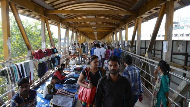 The court directed no hawking be permitted on foot overbridges within the railway premises, as directed by the Supreme Court in 2004 and reiterated five years later. The court directed no hawking be permitted on foot overbridges within the railway premises, as directed by the Supreme Court in 2004 and reiterated five years later.