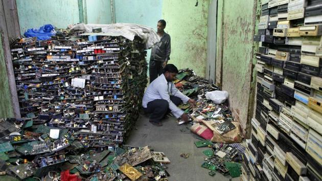 Discarded gadgets often land up in makeshift workshops, where metal is extracted of them using the crudest methods releasing a range of toxic elements.(HT FILE)