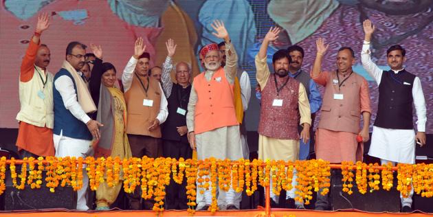 Prime Minister Narendra Modi, BJP’s CM candidate Prem Kumar Dhumal and other senior leaders of the party at the Parivartan rally. Addressing the rally, Modi said it was time to rid ’Devbhoomi’ of monsters. (Shyam sharma/HT)