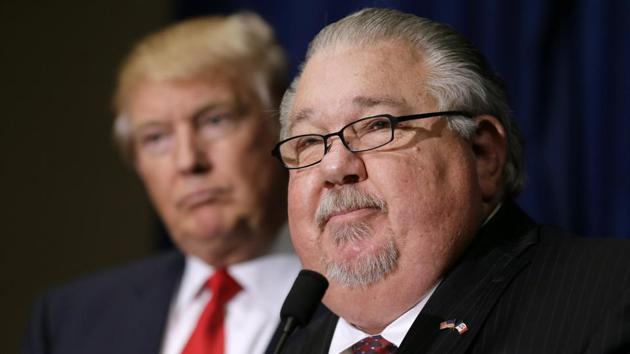 Sam Clovis speaks during a news conference as then-Republican presidential candidate Donald Trump, left, watches before a campaign rally in Dubuque, Iowa. (AP File Photo) Sam Clovis speaks during a news conference as then-Republican presidential candidate Donald Trump, left, watches before a campaign rally in Dubuque, Iowa. (AP File Photo)