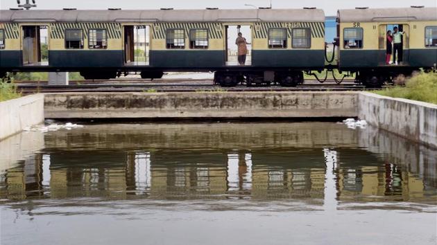 A train moves on its tracks above the flooded subway in Velacherry after incessant rains due to the onset monsoon in Chennai. Trains from south Tamil Nadu to Chennai and flight operations while earlier delayed were restored on Friday. (R Senthil Kumar / PTI) A train moves on its tracks above the flooded subway in Velacherry after incessant rains due to the onset monsoon in Chennai. Trains from south Tamil Nadu to Chennai and flight operations while earlier delayed were restored on Friday. (R Senthil Kumar / PTI)