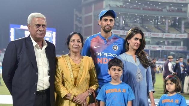 Ashish Nehra spent some time with his family after the match ended. (PTI) 