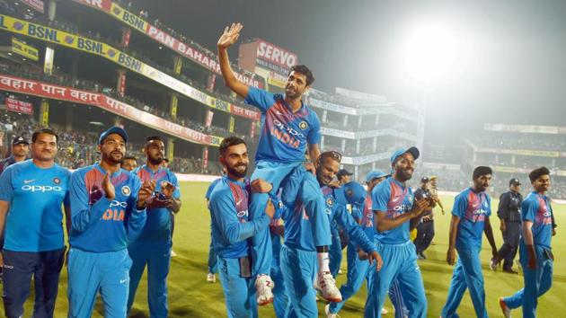 Ashish Nehra is hoisted on the shoulders of Dhawan and Kohli.  (PTI) 