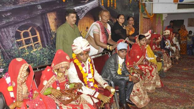 Neetu Kinnar, head of a transgender group blessing couple at a mass wedding ceremony in Bharatpur on Thursday.(HT Photo.)