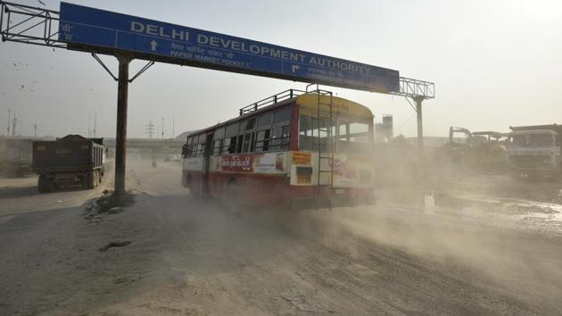 A wave of dust emerges from a road construction site at NH-24. Experts say vehicular emissions and stubble burning by farmers in neighbouring states are primary reasons for the capital’s poor air. Dust particles and construction activity, also contribute to the problem. (Ravi Choudhary/HT PHOTO) A wave of dust emerges from a road construction site at NH-24. Experts say vehicular emissions and stubble burning by farmers in neighbouring states are primary reasons for the capital’s poor air. Dust particles and construction activity, also contribute to the problem. (Ravi Choudhary/HT PHOTO)