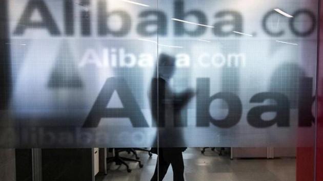 An employee is seen behind a glass wall with the logo of Alibaba at the company's headquarters on the outskirts of Hangzhou, Zhejiang province, April 23, 2014. (Reuters File Photo) An employee is seen behind a glass wall with the logo of Alibaba at the company's headquarters on the outskirts of Hangzhou, Zhejiang province, April 23, 2014. (Reuters File Photo)