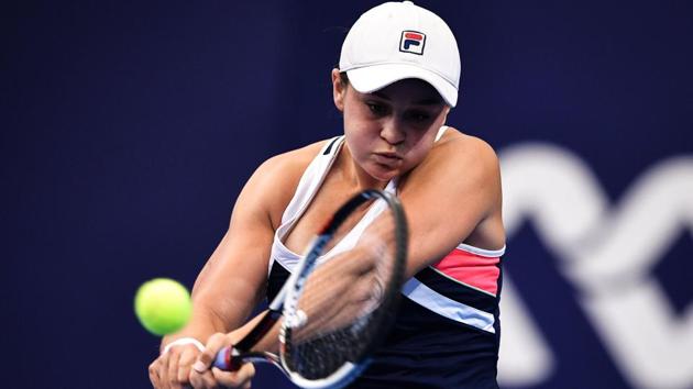 Ashleigh Barty of Australia hits a return against Angelique Kerber of Germany at the WTA Elite Trophy. (AFP) Ashleigh Barty of Australia hits a return against Angelique Kerber of Germany at the WTA Elite Trophy. (AFP)