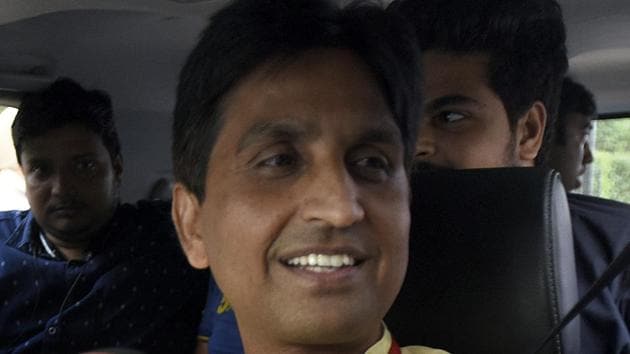 AAP leader Kumar Vishwas talks to media persons after attending the AAP National Council Meeting in New Delhi on Thursday.(Sushil Kumar/HT PHOTO) AAP leader Kumar Vishwas talks to media persons after attending the AAP National Council Meeting in New Delhi on Thursday.(Sushil Kumar/HT PHOTO)