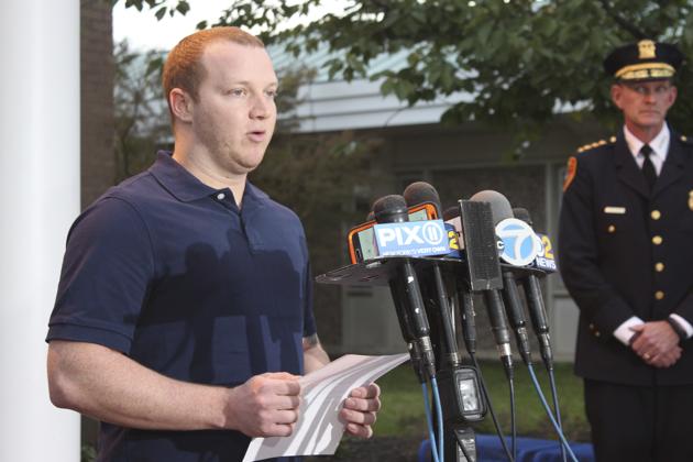 New York City police officer Ryan Nash speaks to reporters at the Suffolk County Police Department's Fifth Precinct in Patchogue. (AP Photo) New York City police officer Ryan Nash speaks to reporters at the Suffolk County Police Department's Fifth Precinct in Patchogue. (AP Photo)