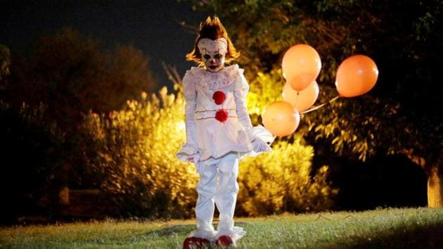 A child dressed as Pennywise, the dancing clown from the movie ‘It’ poses for a photo during a Halloween party in Ciudad Juarez, Mexico. (Jose Luis Gonzalez / REUTERS) A child dressed as Pennywise, the dancing clown from the movie ‘It’ poses for a photo during a Halloween party in Ciudad Juarez, Mexico. (Jose Luis Gonzalez / REUTERS)
