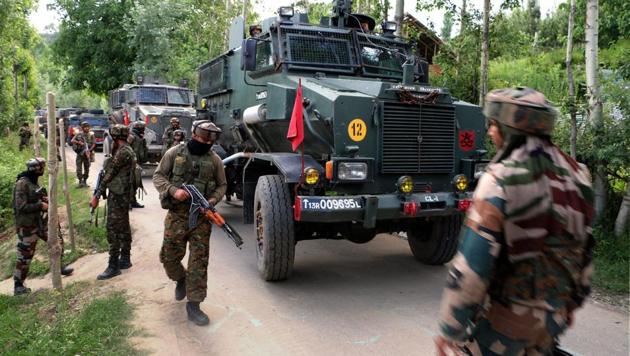 Army cordoning off an area near the house where militants were hiding during an encounter at Bamnoo in Pulwama district of south Kashmir. (PTI File Photo) Army cordoning off an area near the house where militants were hiding during an encounter at Bamnoo in Pulwama district of south Kashmir. (PTI File Photo)