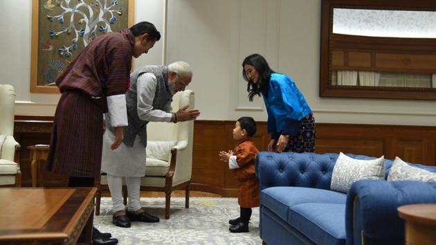 Bhutanese King Jigme Khesar Namgyel Wangchuck and Queen Jetsun Pema look on as Prime Minister, Narendra Modi interacts with their son, Prince Jigme Namgyel Wangchuck during a meeting in New Delhi on Wednesday. (PMO)