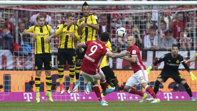 Bayern Munich face Borussia Dortmund in a crucial Bundesliga encounter on Saturday. (AP) Bayern Munich face Borussia Dortmund in a crucial Bundesliga encounter on Saturday. (AP)