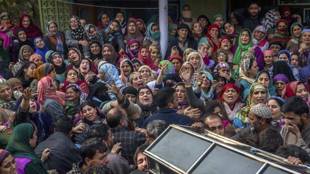 Relatives and neighbours of Gowhar Hussain Bhat, a BJP youth leader, carry his coffin during his funeral in Shopian, Kashmir on Friday. The body of 30-year-old Bhat was recovered from an orchard in Kiloora with his throat slit, and attributed to insurgents by the police. (Dar Yasin / AP)