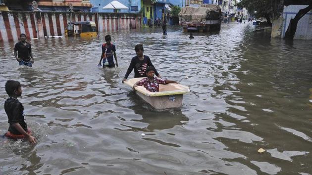 A boy pushes another in a bathtub in a waterlogged street in Chennai, India, Friday, Nov. 3, 2017 (AP) A boy pushes another in a bathtub in a waterlogged street in Chennai, India, Friday, Nov. 3, 2017 (AP)